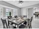 Dining room features a bay window and a view of the kitchen at 4017 103Rd N Ave, Clearwater, FL 33762