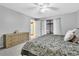 Bright main bedroom with a sliding door leading to a screened patio at 4017 103Rd N Ave, Clearwater, FL 33762