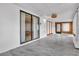 Enclosed sun room with ceramic tile flooring, bright lighting, and sliding glass doors to the outside at 4017 103Rd N Ave, Clearwater, FL 33762