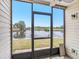 Relax on the screened patio with beautiful water views at 404 Moorings Cove Dr # 404, Tarpon Springs, FL 34689