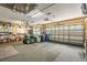 Spacious garage with overhead storage and ample space for parking and projects at 4615 Cozzo Dr, Land O Lakes, FL 34639