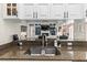 Gourmet kitchen featuring granite countertops, stainless steel appliances and open access to living area at 4615 Cozzo Dr, Land O Lakes, FL 34639