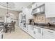 Modern kitchen featuring granite countertops, stainless steel appliances and a breakfast bar at 4615 Cozzo Dr, Land O Lakes, FL 34639