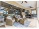 Inviting lanai with comfortable seating and outdoor dining area, great for entertaining and relaxation at 4615 Cozzo Dr, Land O Lakes, FL 34639