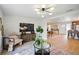 Well lit Living Room area with view to the dining room and kitchen at 5647 110Th Way, Seminole, FL 33772