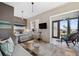 Bright and open concept bedroom, seamlessly blends sleeping and seating areas at 5659-5657 Shore S Blvd, Gulfport, FL 33707
