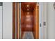 Elevator featuring wood paneling, interior lighting and control panel at 5659-5657 Shore S Blvd, Gulfport, FL 33707