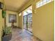 Welcoming entryway featuring a secure gated entrance, and a sheltered foyer area at 5659-5657 Shore S Blvd, Gulfport, FL 33707