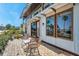 Inviting outdoor patio with stylish seating, perfect for enjoying the beautiful scenery and natural light at 5659-5657 Shore S Blvd, Gulfport, FL 33707