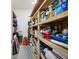 Organized storage room with shelving units, providing ample space for various items at 5659-5657 Shore S Blvd, Gulfport, FL 33707
