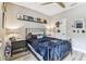 Inviting bedroom features hardwood floors and tasteful decorations at 6022 S Elkins Ave, Tampa, FL 33611