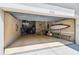Spacious two car garage with storage racks and epoxy flooring at 6022 S Elkins Ave, Tampa, FL 33611