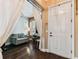 Home office with hardwood floors, neutral paint, white blinds, and natural light at 6022 S Elkins Ave, Tampa, FL 33611
