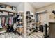 Spacious walk-in closet with custom shelving providing lots of storage at 6022 S Elkins Ave, Tampa, FL 33611