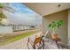 Backyard patio and seating area with waterfront views and boat docks at 620 Bayway Blvd # 1, Clearwater, FL 33767