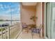 Balcony seating area with chairs and small table with harbor views at 620 Bayway Blvd # 1, Clearwater, FL 33767