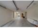 Spacious garage with surfboard; offers ample room for parking and storage at 620 Bayway Blvd # 1, Clearwater, FL 33767