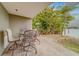 Inviting waterfront patio featuring brick pavers and cozy outdoor seating area at 620 Bayway Blvd # 1, Clearwater, FL 33767