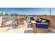 A spacious outdoor patio features comfortable seating with bay and city views at 620 Bayway Blvd # 1, Clearwater, FL 33767