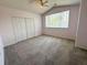 Bedroom features include vaulted ceiling, ceiling fan, fresh carpet, and double closet at 6304 Parkside Meadow Dr, Tampa, FL 33625