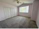 Bedroom features include vaulted ceiling, ceiling fan, fresh carpet, and double closet at 6304 Parkside Meadow Dr, Tampa, FL 33625