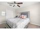 Inviting bedroom with a plush bed and ample natural light at 6708 Hazelnut Spice Dr, Ruskin, FL 33573
