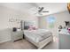 A well-lit bedroom featuring a comfortable bed and large window at 6708 Hazelnut Spice Dr, Ruskin, FL 33573