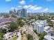 Great aerial view featuring a city skyline and lush green trees at 700 Beach Ne Dr # 803, St Petersburg, FL 33701