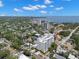 An aerial view of the white condo building in its residential neighborhood at 700 Beach Ne Dr # 803, St Petersburg, FL 33701