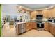 Modern kitchen with stainless steel appliances, granite countertops, and open floor plan with outside views at 700 Beach Ne Dr # 803, St Petersburg, FL 33701