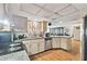 Updated kitchen with modern appliances and ample cabinet space, ideal for cooking enthusiasts at 8907 Pandora Ln, Port Richey, FL 34668