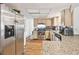 Kitchen with stainless steel appliances and neutral cabinetry, offering a functional cooking space at 8907 Pandora Ln, Port Richey, FL 34668
