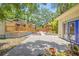Large backyard with a deck and a separate outbuilding at 906 E Broad St, Tampa, FL 33604