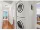 Efficient laundry area with stacked washer and dryer at 906 E Broad St, Tampa, FL 33604