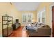 Comfortable living room with hardwood floors and bright natural light at 906 E Broad St, Tampa, FL 33604
