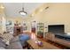 Inviting living room with vaulted ceiling, fireplace and stylish furniture at 906 E Broad St, Tampa, FL 33604