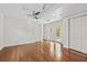 Main bedroom featuring hardwood floors, closet, recessed lights, and French doors to a deck at 906 E Broad St, Tampa, FL 33604