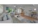 Comfortable living room with stylish furniture, a ceiling fan, and natural light at 9410 Alanbrooke St, Temple Terrace, FL 33637