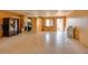 Open-concept living space flows seamlessly to the kitchen, with ample room to make it your own at 9469 Treasure Ne Ln, St Petersburg, FL 33702