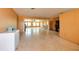 Spacious living area with ample natural light and neutral paint, ready for personalization at 9469 Treasure Ne Ln, St Petersburg, FL 33702