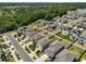 A picturesque aerial view of the neighborhood, featuring neat landscaping and well-maintained homes at 9914 Calypso Orchid Ct, Riverview, FL 33578
