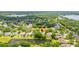 An aerial shot displays the home within its lakeside community setting at 2207 Climbing Ivy Dr, Tampa, FL 33618