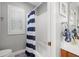 Bathroom with shower, toilet and tiled floors at 2207 Climbing Ivy Dr, Tampa, FL 33618