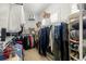 Well-organized walk-in closet with wire shelving and ample storage space at 2207 Climbing Ivy Dr, Tampa, FL 33618