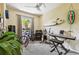 Multi-purpose room includes a window, plants, music, and sports equipment for hobbies and leisure at 1003 Fairwaycove Ln # 103, Bradenton, FL 34212