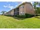 Beautiful condo featuring back patios, well-maintained lawns, and professional landscaping at 1003 Fairwaycove Ln # 103, Bradenton, FL 34212