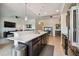 Open kitchen featuring stainless appliances, island, and seating at 1003 Fairwaycove Ln # 103, Bradenton, FL 34212