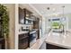 Modern kitchen with stainless steel appliances at 1003 Fairwaycove Ln # 103, Bradenton, FL 34212