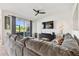 Inviting living room with patio access and nature views at 1003 Fairwaycove Ln # 103, Bradenton, FL 34212