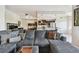 Spacious open-concept living area flowing into the kitchen, perfect for entertaining and modern living at 1003 Fairwaycove Ln # 103, Bradenton, FL 34212